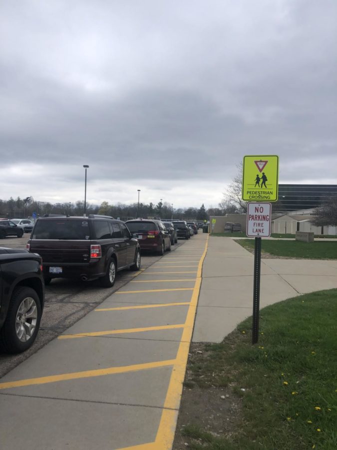 The backup in the Groves parking lot creates an issue for students to be on time for class. 