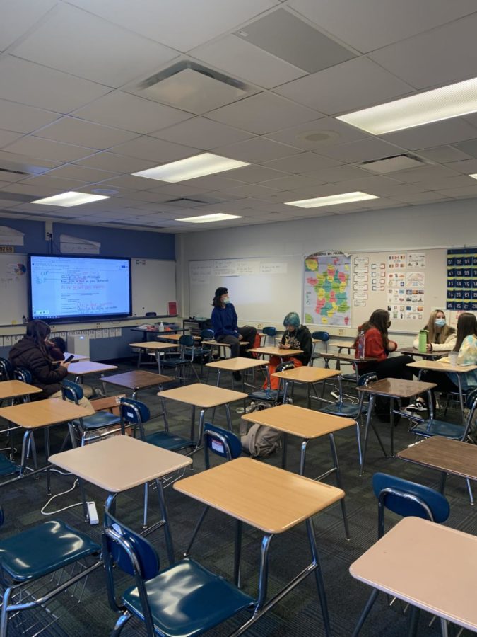 Desks empty, absences plentiful, and a classroom environment unlike most. The Monday after homecoming, October 4, found many classes similar to this one. Seniors pictured in this AP French class were only a small fraction of the typical class size. 