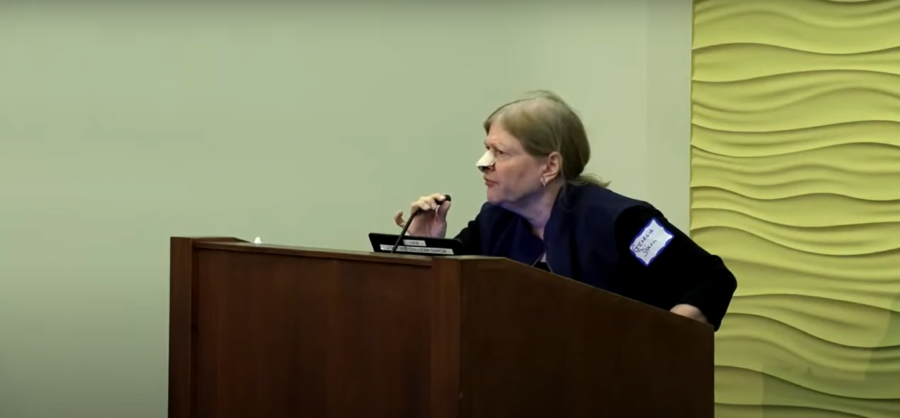 Vocal anti-vaxxer and anti-masker Christina Odell speaks at the Birmingham Public School District board meeting on October 17. In her speech, she mocked mask wearers and compared this current situation to the Marxist agenda. She wears her nametag on the side of her arm, an ode to Nazi soldiers who wore their swastikas' armbands in the same place. Odell referred to COVID as a hoax, and not something to fret about. “It’s a virus, a germ; unfortunate, but you'll survive,” Odell said.