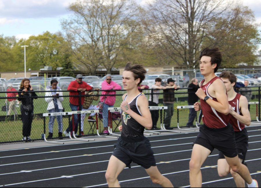 Freshman Aiden LaVictor leading a pack of Seaholm runners at the Seaholm dual meet.