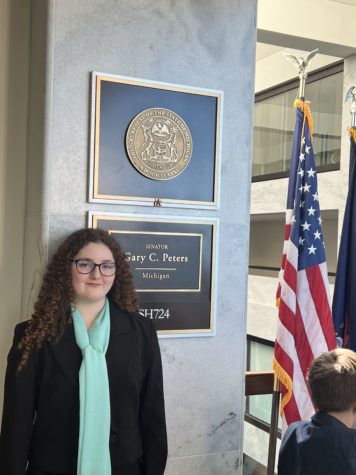 Photo by Samantha Jacobs. Photo of Michigan Youth Ambassador for the Tourette Association of America, Samantha Jacobs, outside Michigan Senator Gary C. Peters’ office, just after meeting with one of their representatives to discuss the Tourette Association of America’s 2023 congressional asks.