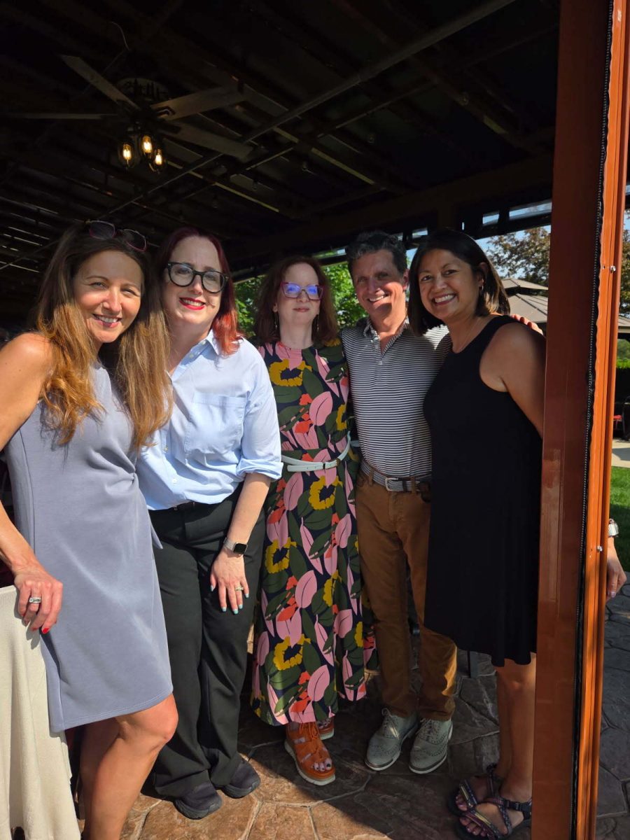 Retiring teachers pose for a picture during the BEA retirement celebration. From left to right, Spanish teacher Rebecca Schrauwen, retired English teacher Amy Voigt, English and history teacher Susan Warrow, former history teacher Scott Warrow and science teacher Cynthia Sherman.