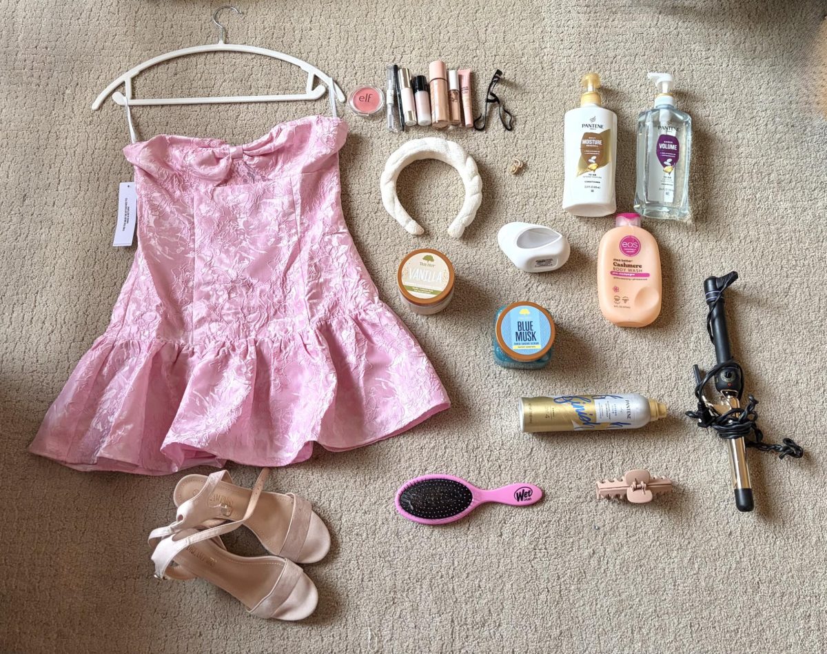 Everything that is needed to prepare for the homecoming dance; a dress, heels, makeup, shower products, hair tools, and various other products.