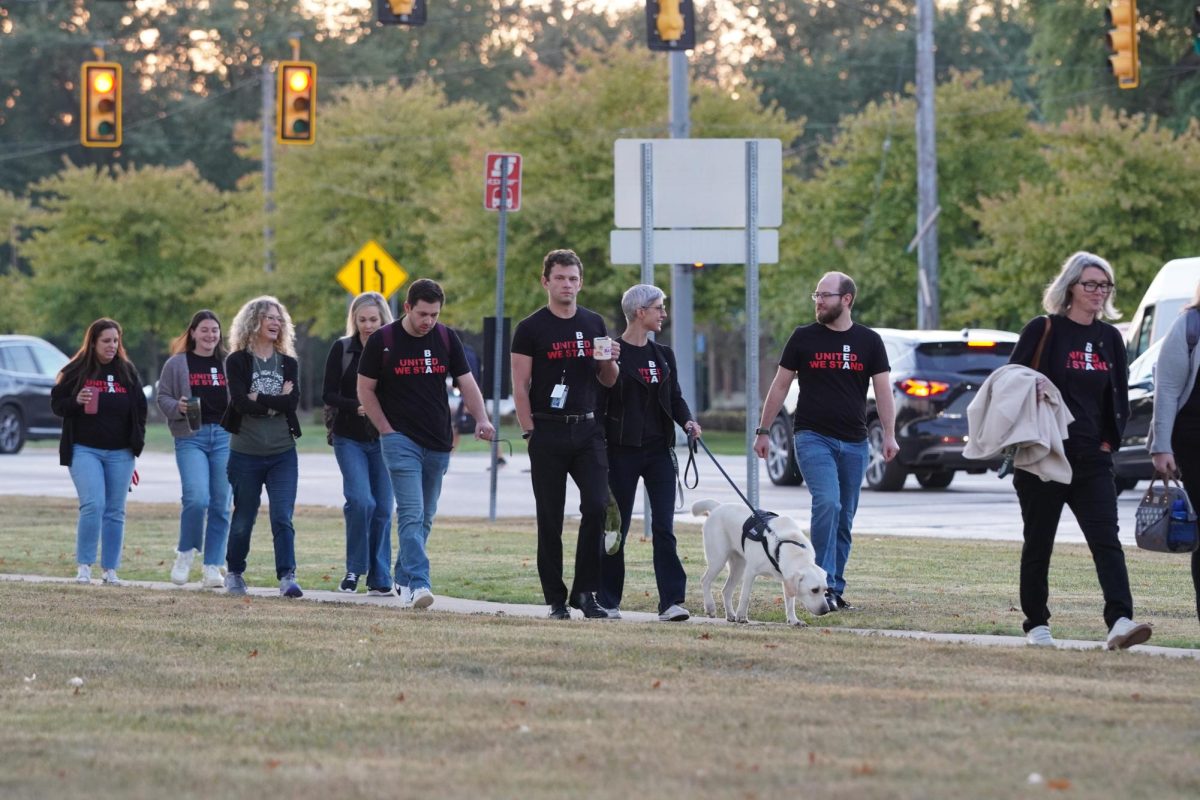 Groves teachers doing a walk-in on October 4, 2025, demonstrating their unity and dedication to the fight for a fair and equitable contract. Wearing their matching “BEA United We Stand” t-shirts, they are bringing this fight to the attention of the surrounding community and showing solidarity with their coworkers. 
