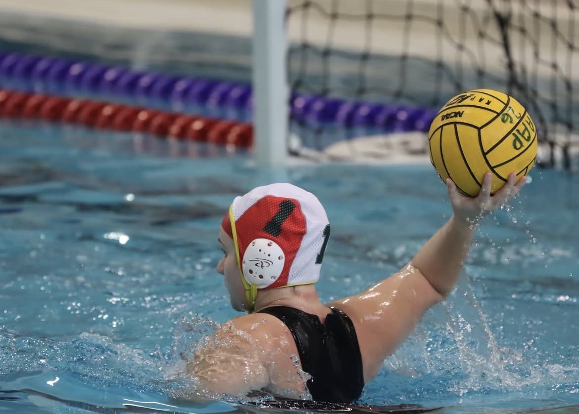 Groves senior and goalie Baity Wagner makes a long pass after a save.