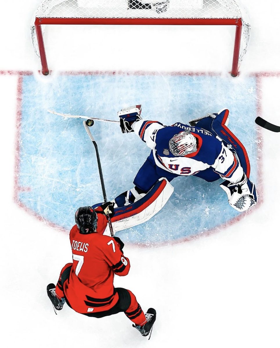 Team USA’s Connor Hellebuyck has the save of the tournament against Canada’s Devon Toews.
