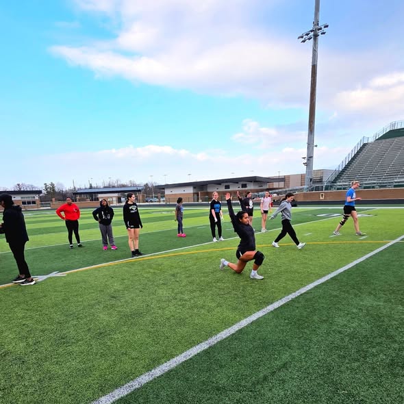 The Groves Girls Flag Football team practices for their upcoming season.