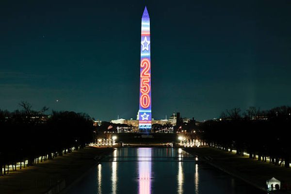 WASHINGTON, DC – DECEMBER 31: The Washington Monument is illuminated with Freedom 250 projections on December 31, 2025, in Washington, DC. As part of a New Year’s Eve celebration, each side of the monument features storytelling projections throughout the evening to kick off the United States’ 250th anniversary in 2026. (Photo by Heather Diehl/Getty Images)